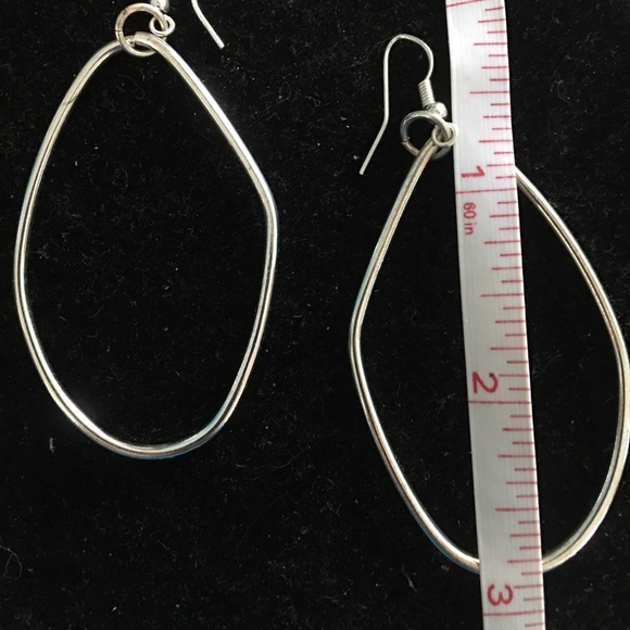 Stunning rhodium plated oval ish dangling hoops - Picture 3 of 4